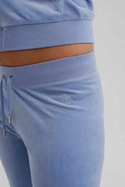 Juicy Couture DELLA ROBIA LOW RISE FLARE CLASSIC VELOUR TRACK PANT 10 Juicy Couture DELLA ROBIA LOW RISE FLARE CLASSIC VELOUR TRACK PANT -Juicy Couture LAYLALOWRISE JCBB122005 102 DELLAROBIABLUEDELRAYBOTTOMS JCAP180 121 ALMONDBLOSSOM 046